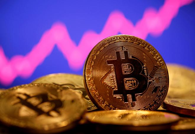 Le bitcoin dépasse la barre des 60000 dollars, nouveau record